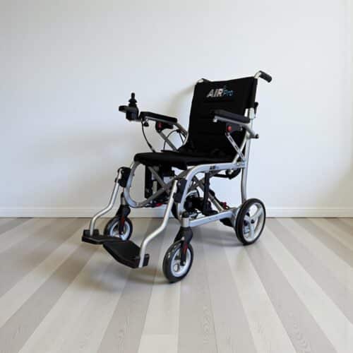 Photo showing a three-quarter view of the left side and front of a Silver, Monarch Air Pro Second hand Powerchair.