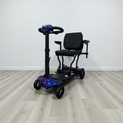 Photo showing a three-quarter view of the left of a blue, Monarch Genie Lightweight Second hand mobility scooter.