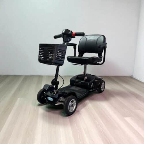 Photo showing a three-quarter view of the left side and front of a Black, Pride Apex Alumalite Second hand mobility scooter.