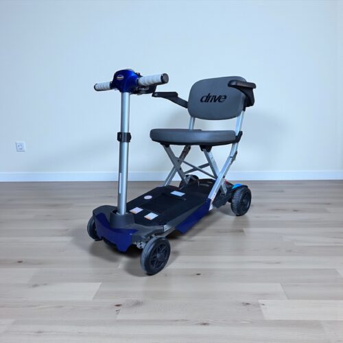 Photo showing a three-quarter view of the left of a black and blue, Drive Travelease Second hand mobility scooter.