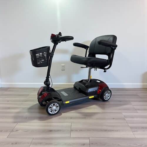 Photo showing a three-quarter view of the left of a Red, Roma Dallas Second hand mobility scooter.