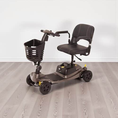 Photo showing a three-quarter view of the left of a Bronze, Liberty Vogue Second hand mobility scooter.