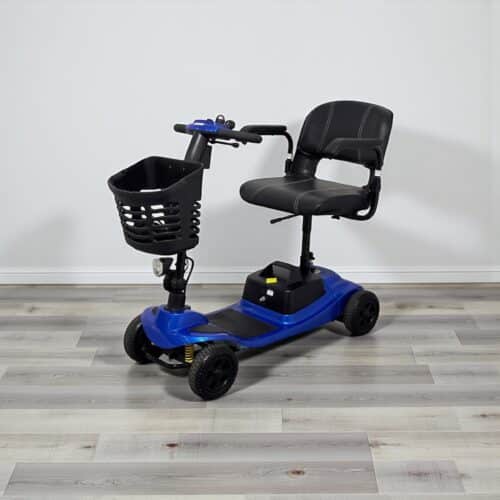 Photo showing a three-quarter view of the left of a Blue, Liberty Vogue Second hand mobility scooter.